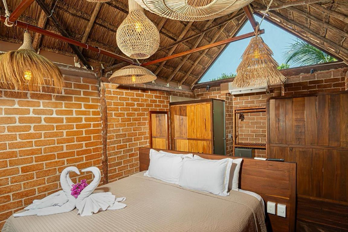 Kabanas & Beach Club Ojo De Agua 푸에르토 모렐로스 외부 사진